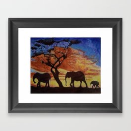 sunset on elephant family moving Framed Art Print