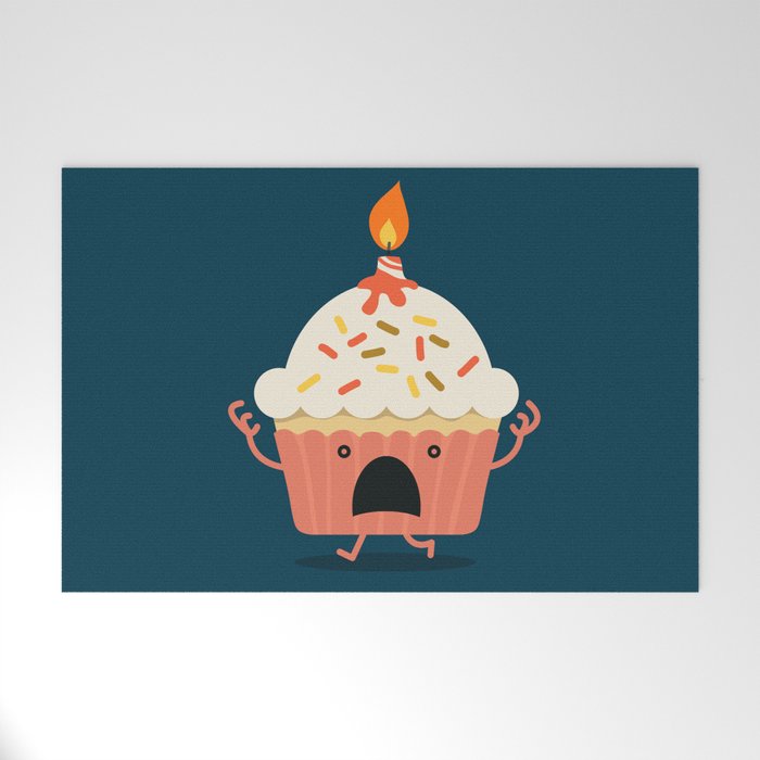 Cupcake on fire Welcome Mat