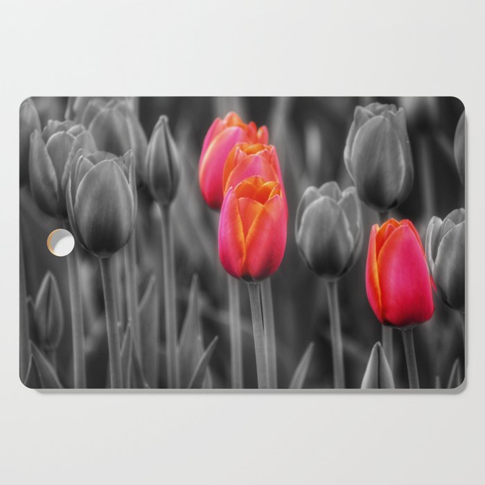 Red Tulips - color splash photography  Cutting Board
