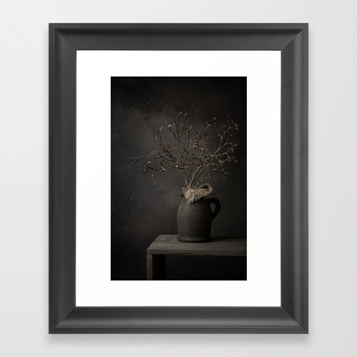 Dark still life with magnolia branches  Framed Art Print