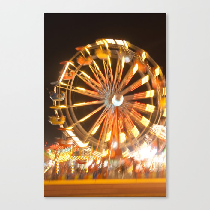 Ferris Wheel in Motion at Night Canvas Print