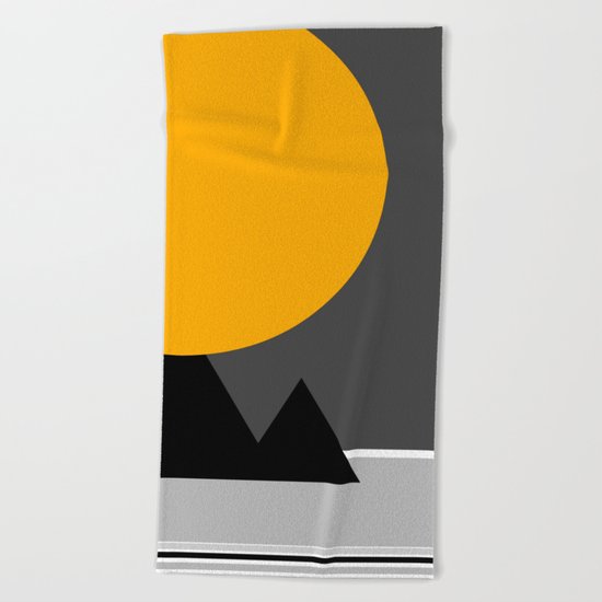 sun over Pyramides Beach Towel