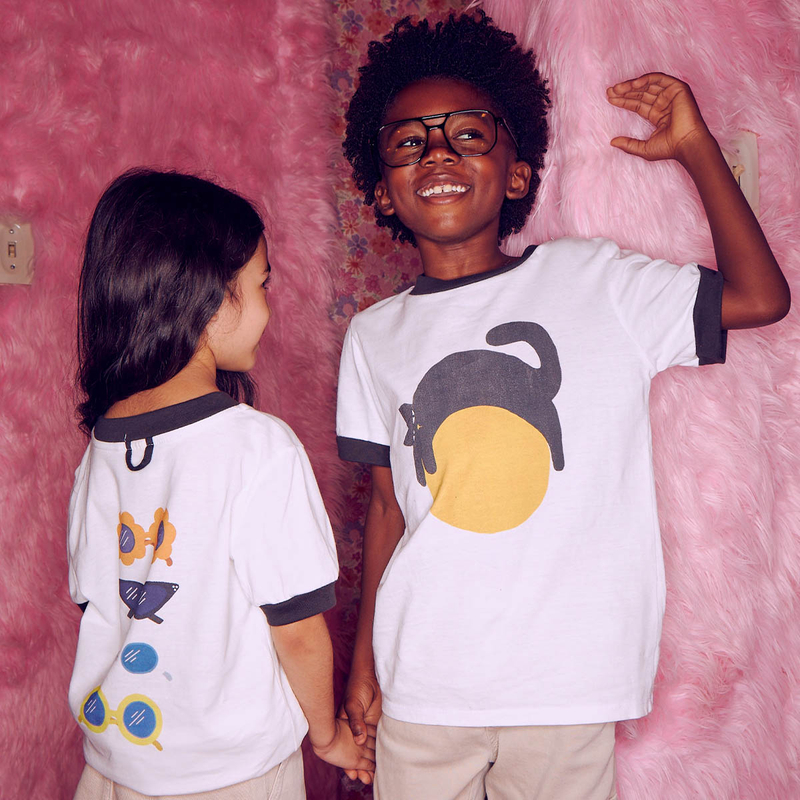 children wearing ringer t-shirts with designs of cats and sunglasses