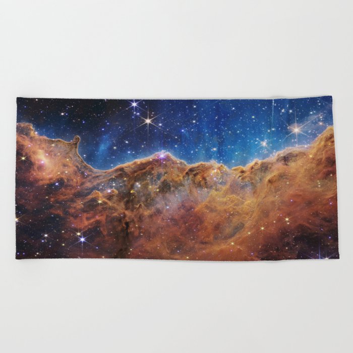 “Cosmic Cliffs” in the Carina Nebula from NASA’s James Webb Space Telescope (NIRCam Image) Beach Towel