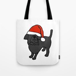 Cute dog wearing a Santa hat Tote Bag