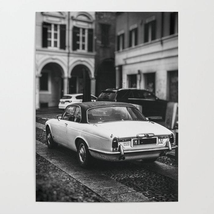 vintage jaguar car in vertical black and white background Poster