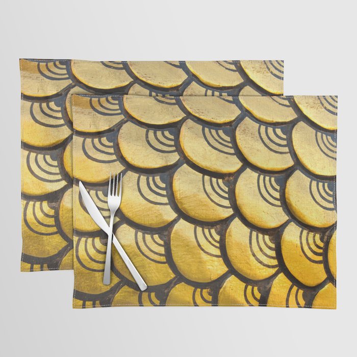 Golden chinese dragon statue's scale as a pattern.  Placemat