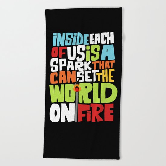 a spark inside Beach Towel