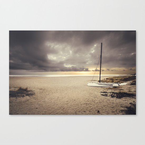 Dramatic sunrise on the beach Canvas Print