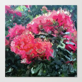 Red flower blossoms amid lush green foliage Canvas Print