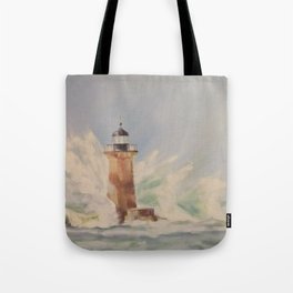 Lighthouse caught in a wave Tote Bag