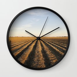 Plowed cotton fields on the outskirts of Clarksdale in Mississippis Delta region Wall Clock