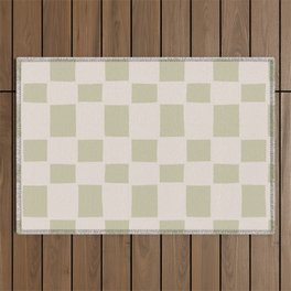 Tipsy checker in dusty olive Outdoor Rug