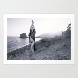 On an island in the sun; female sun goddess with arms raised to the sun black and white photographic art print Art Print