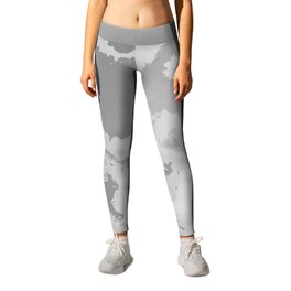 Different shades of grey color cloudy and wavy marble layout on solid sheet of wallpaper. Concept of home decor and interior designing Leggings