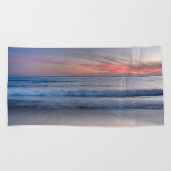 "Magical waves at sunset" Beach Towel