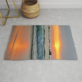 Golden sunset with turquoise waters Rug