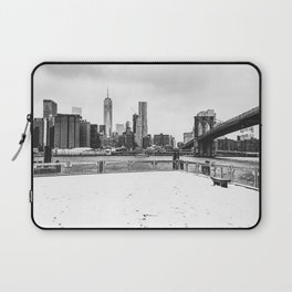 Brooklyn Bridge and Manhattan skyline during winter snowstorm in New York City black and white Laptop Sleeve
