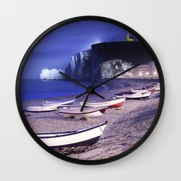 Etretat bay beach and boats on foggy night. Normandy, France. Wall Clock