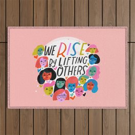We Rise by Lifting Others Outdoor Rug