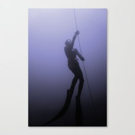 Freediver ascends. Canvas Print