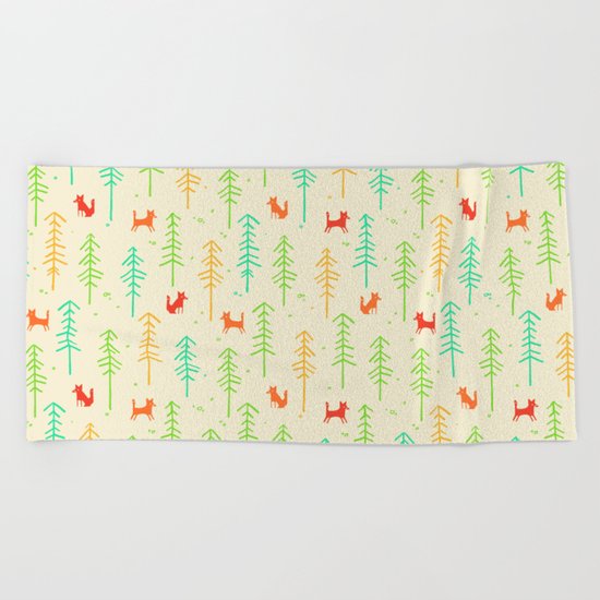 Foxes hiding in the forest Beach Towel