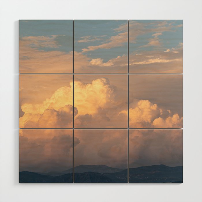 Cloudy orange sunset over the mountains Wood Wall Art