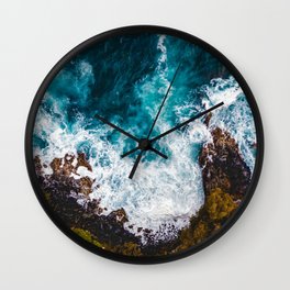 Aerial view of ocean waves pattern and fantastic rocky coast  Wall Clock