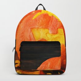 Halloween Pumpkin with Leaves on Wooden Background Backpack