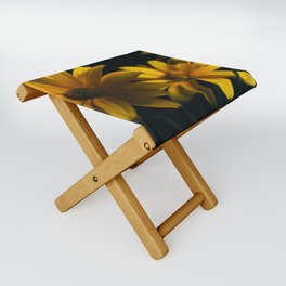 Colorful yellow flowers on a black background Folding Stool