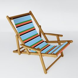 [ Thumbnail: Light Sky Blue, Forest Green, Red, Black, and White Colored Striped/Lined Pattern Sling Chair ]