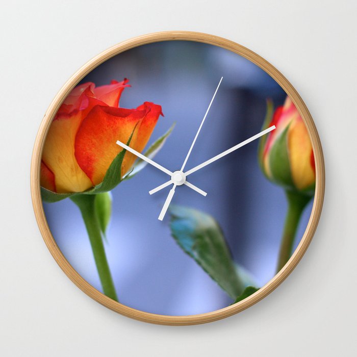 "Love planted a rose and the world turned sweet" Wall Clock