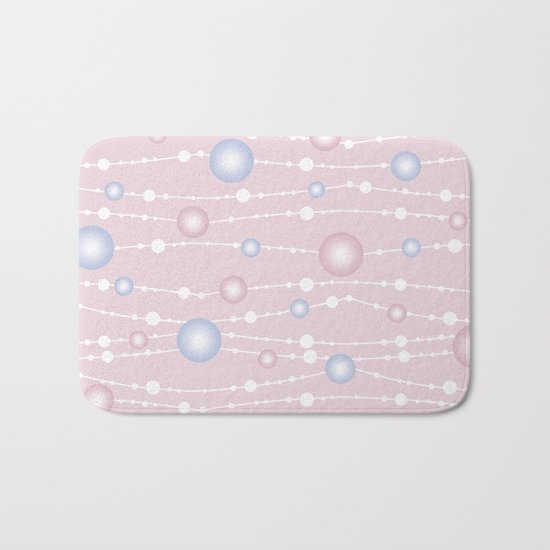 Beads on a cream background. Bath Mat