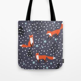Red foxes in the nignt winter forest Tote Bag