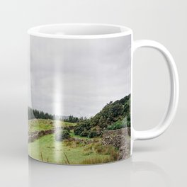 Ancient dry stone walls weave their ways along the hills of the Lake District, England. Coffee Mug