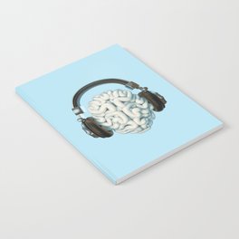 Mind Music Connection /3D render of human brain wearing headphones Notebook