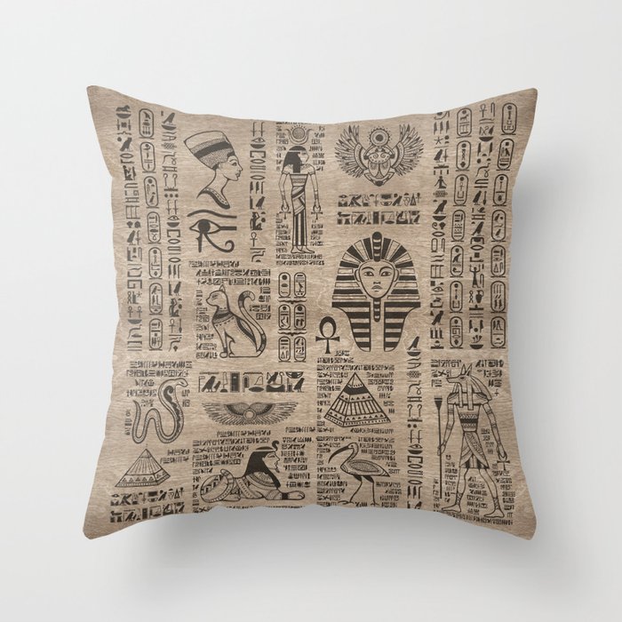 Egyptian hieroglyphs and symbols on wood Throw Pillow