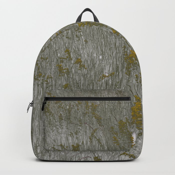 yellow flowers in a field Backpack