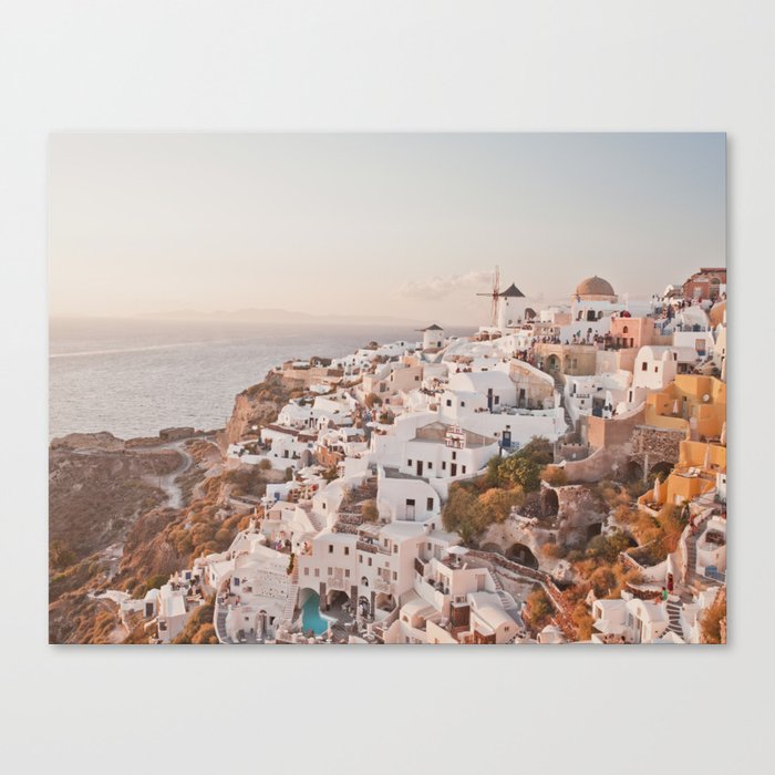 Santorini golden sunset, white houses, dome churches, reflection Canvas Print