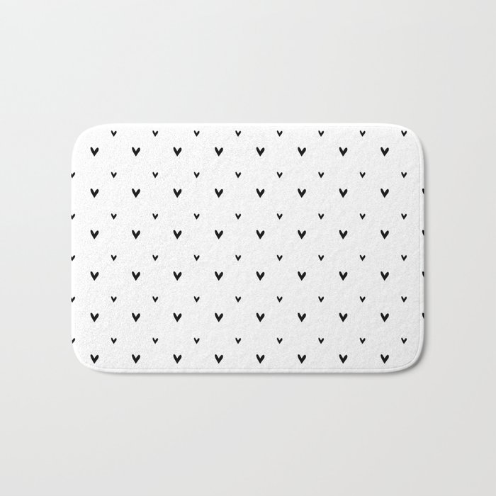 Small sketchy black hearts pattern on white background Bath Mat by  SEAFOAM12