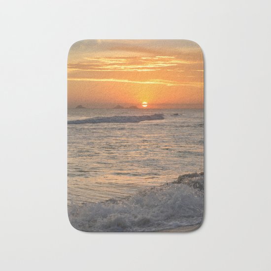 Sunset with crashing waves Bath Mat
