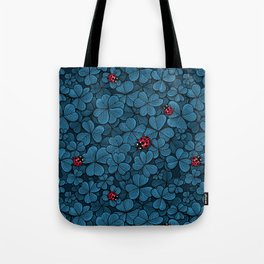 Find the lucky clover in blue Tote Bag