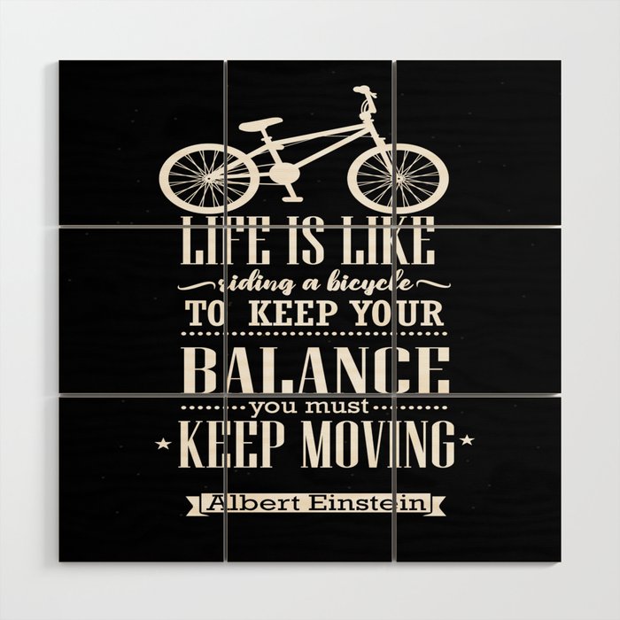 Life is like riding a bicycle. To keep your balance Albert
