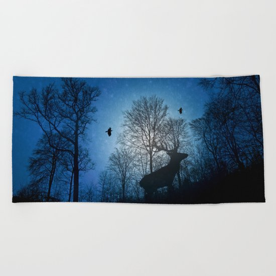 Deer in the snow Beach Towel
