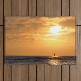 Sunset with sailboat Outdoor Rug