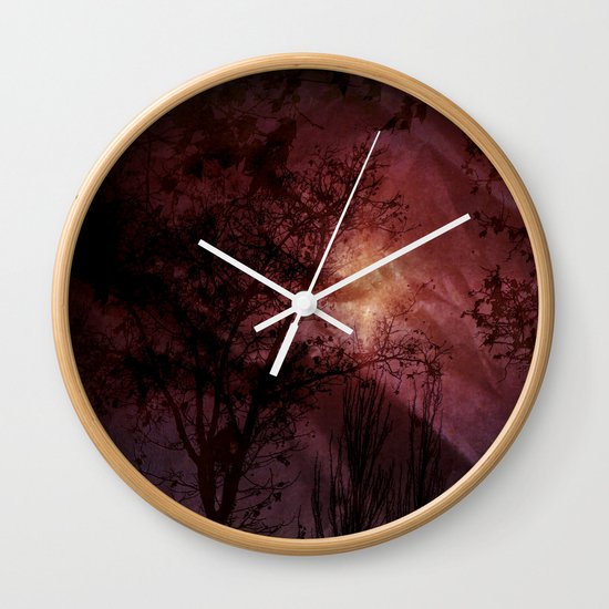 between darkness Wall Clock