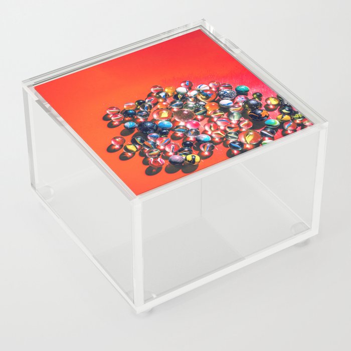 Marbles on vibrant red Acrylic Box