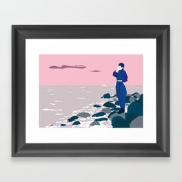 Woman by the sea Framed Art Print