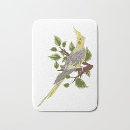  cockatoo nymph bird on branch with green leaves Bath Mat