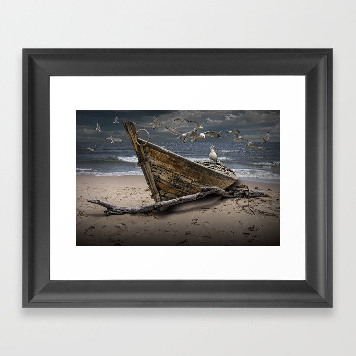 Gulls Flying over a Shipwrecked Wooden Boat Framed Art Print